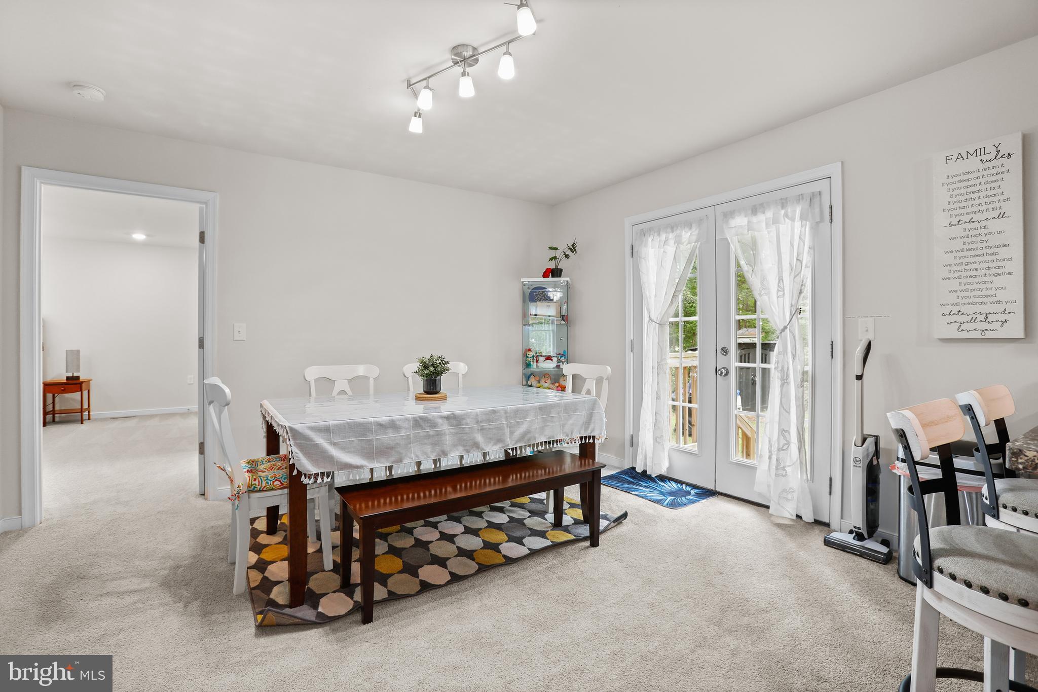 662 North Glebe Road Montross, VA 22520 - Photo 10 of 34 a bedroom that has a bed and a table in it