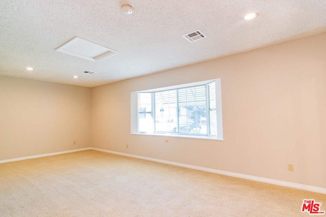 3865 Edenhurst Avenue Los Angeles, CA 90039 - Photo 11 of 22 an empty room with a window