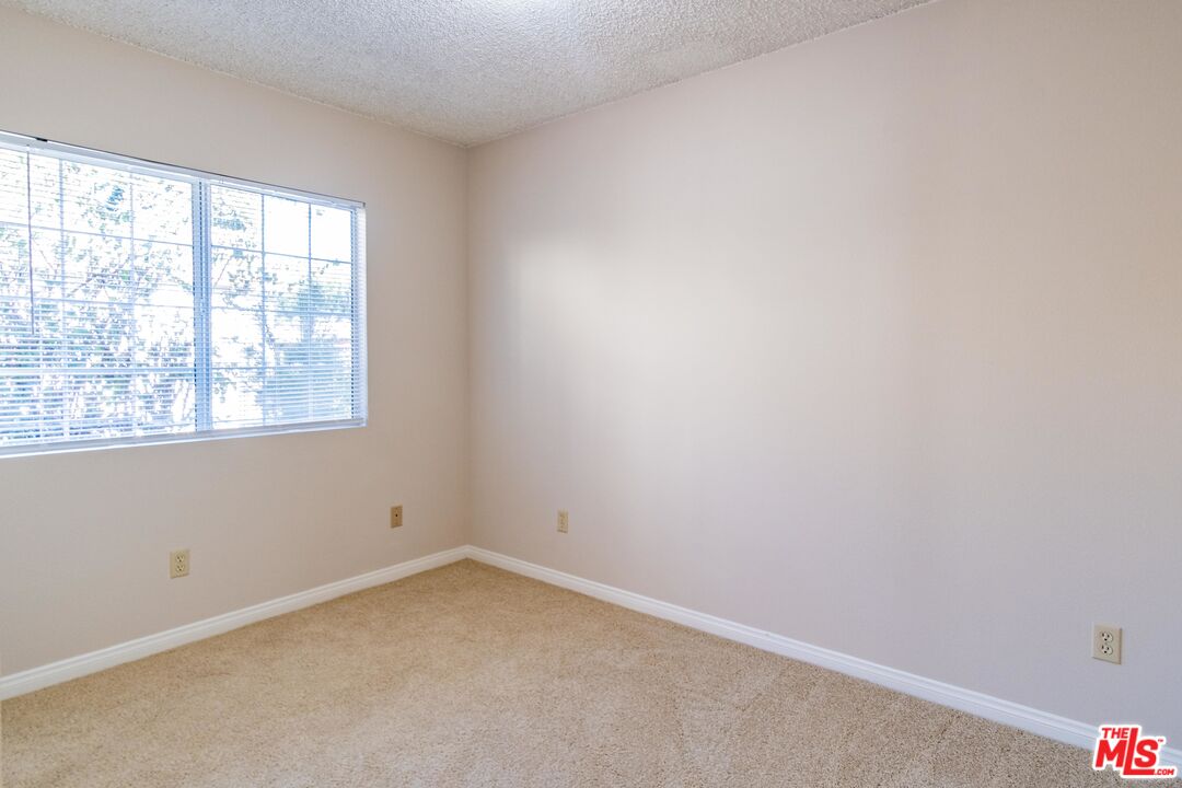 3865 Edenhurst Avenue Los Angeles, CA 90039 - Photo 8 of 22 an empty room with a window