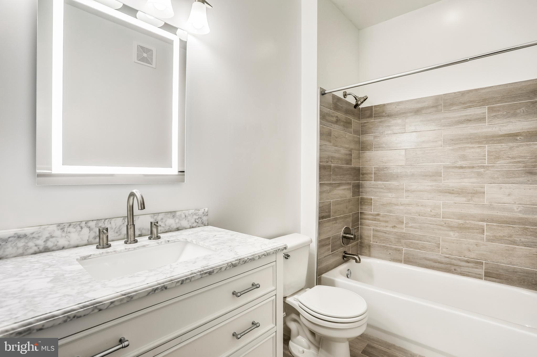 120 Chevy Chase Street, Unit 405 Gaithersburg, MD 20878 - Photo 13 of 34 Beautifully Renovated Second Bathroom