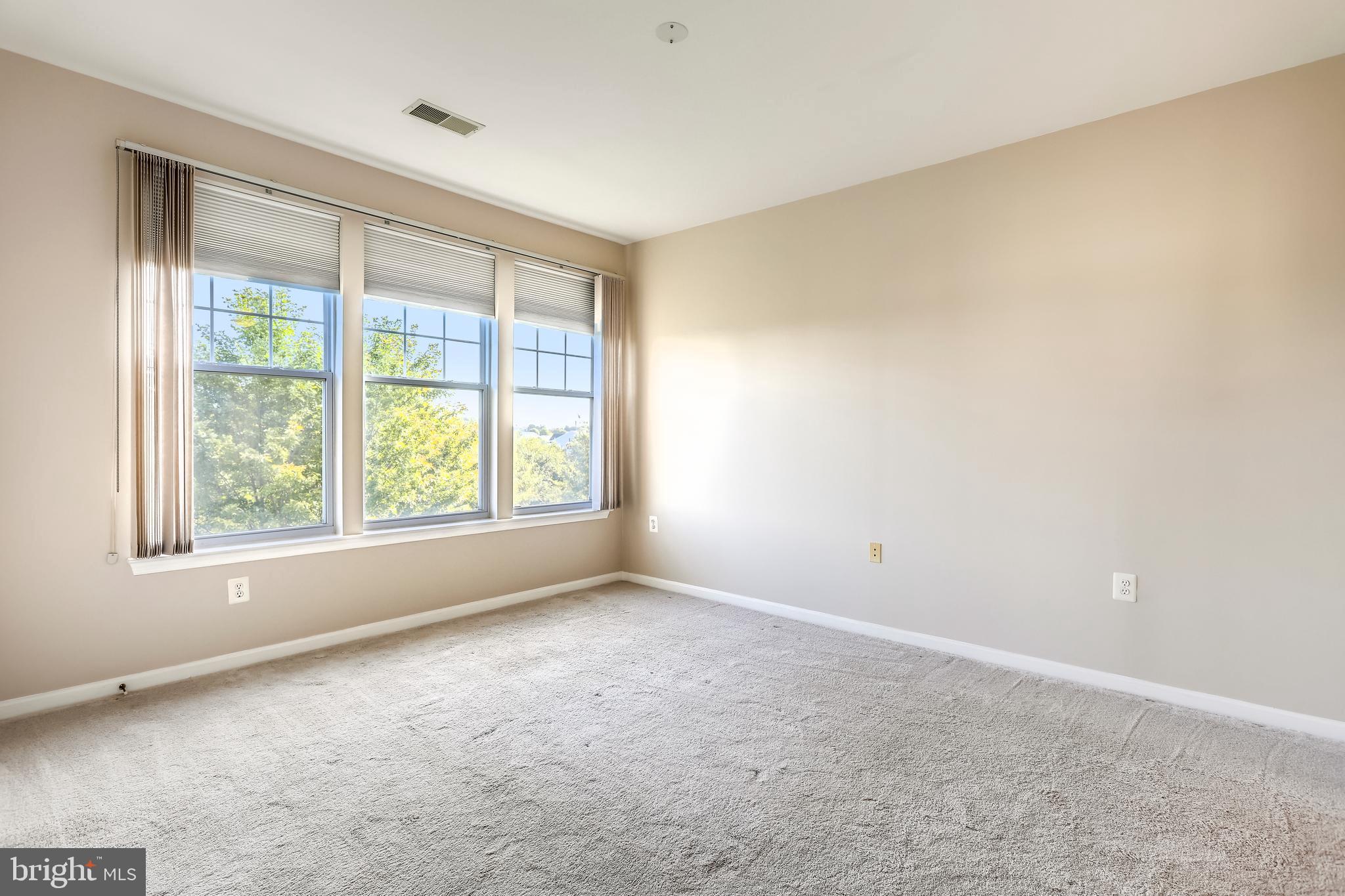 120 Chevy Chase Street, Unit 405 Gaithersburg, MD 20878 - Photo 20 of 34 Owner's Bedroom