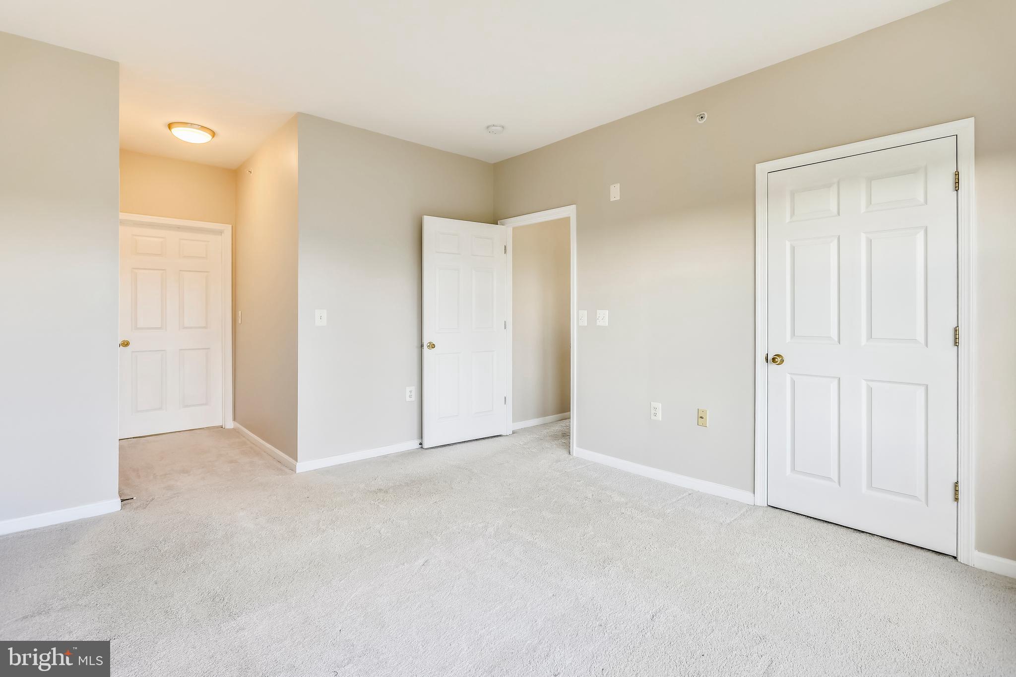 120 Chevy Chase Street, Unit 405 Gaithersburg, MD 20878 - Photo 21 of 34 Owner's Bedroom