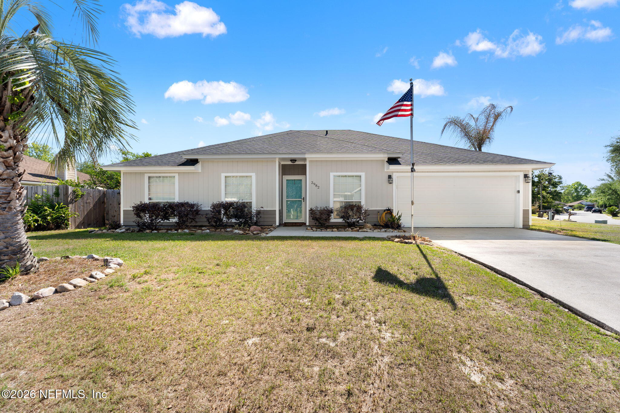 2982 Chief Ridaught Trail Middleburg, FL 32068 - Photo 2 of 29 a front view of a house with a yard
