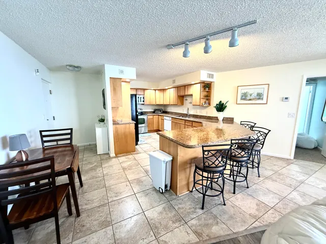 a view of a dining room with furniture