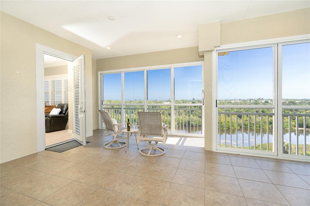10501 Amberjack Way, Unit 402 Englewood, FL 34224 - Photo 22 of 45 a view of an empty room and window