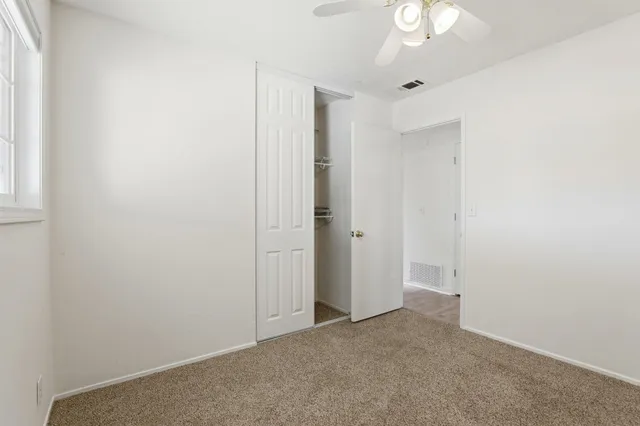 an empty room with a bathroom