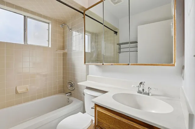 a bathroom with a sink and a bathtub