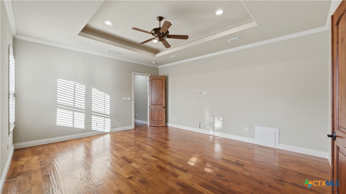 1035 Thunderbolt Rd Canyon Lake Canyon Lake, TX 78133 - Photo 36 of 48 a view of an empty room with a window and wooden floor