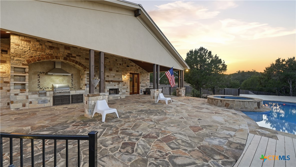 1035 Thunderbolt Rd Canyon Lake Canyon Lake, TX 78133 - Photo 7 of 48 a view of a dinning table and chairs in patio