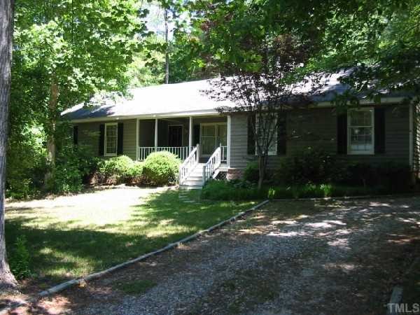 4812 Leven Lane Raleigh, NC 27616 - Photo 1 of 1 a view of a house with backyard and a garden