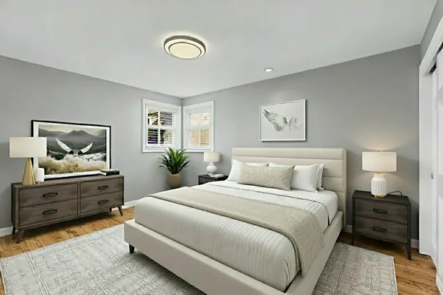 a dining room with furniture and wooden floor