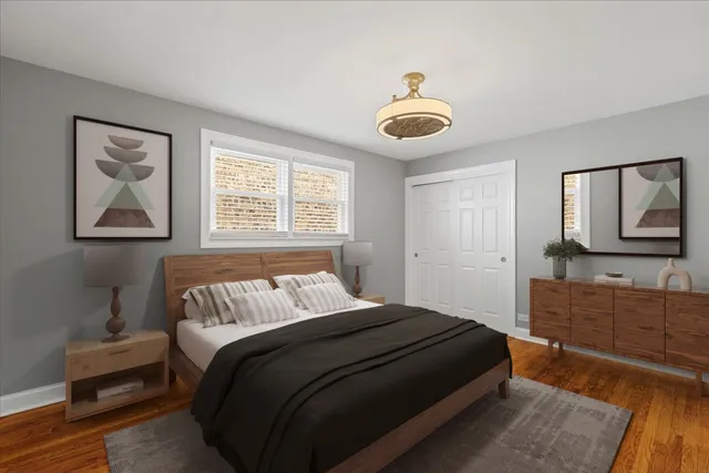 a kitchen with granite countertop a refrigerator and wooden cabinets