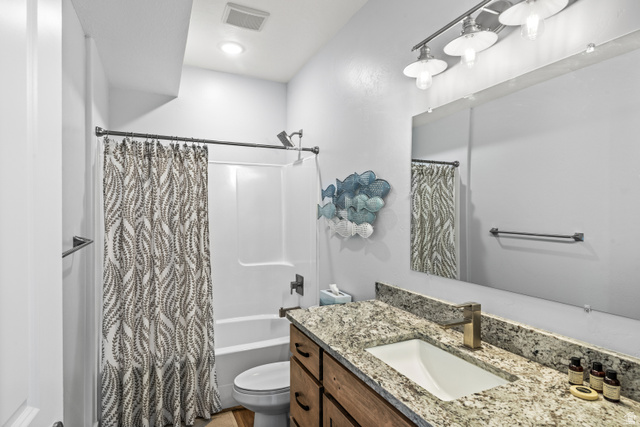 1343 North Trapper Loop Garden City, UT 84028 - Photo 33 of 56 Full bath with vanity, shower / bath combo, and recessed lighting