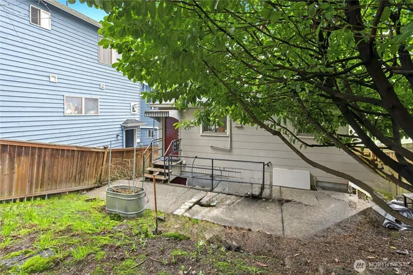 a house view with a backyard space
