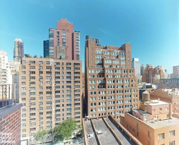 a view of a city with tall buildings