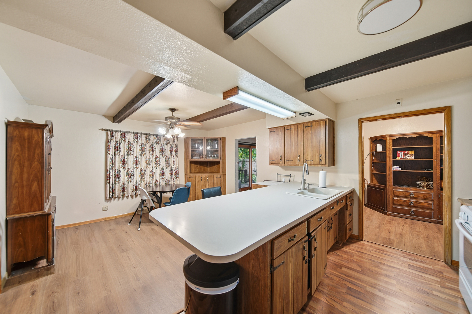 803 4th Avenue Dixon, IL 61021 - Photo 16 of 35 a kitchen with a sink and wooden floor