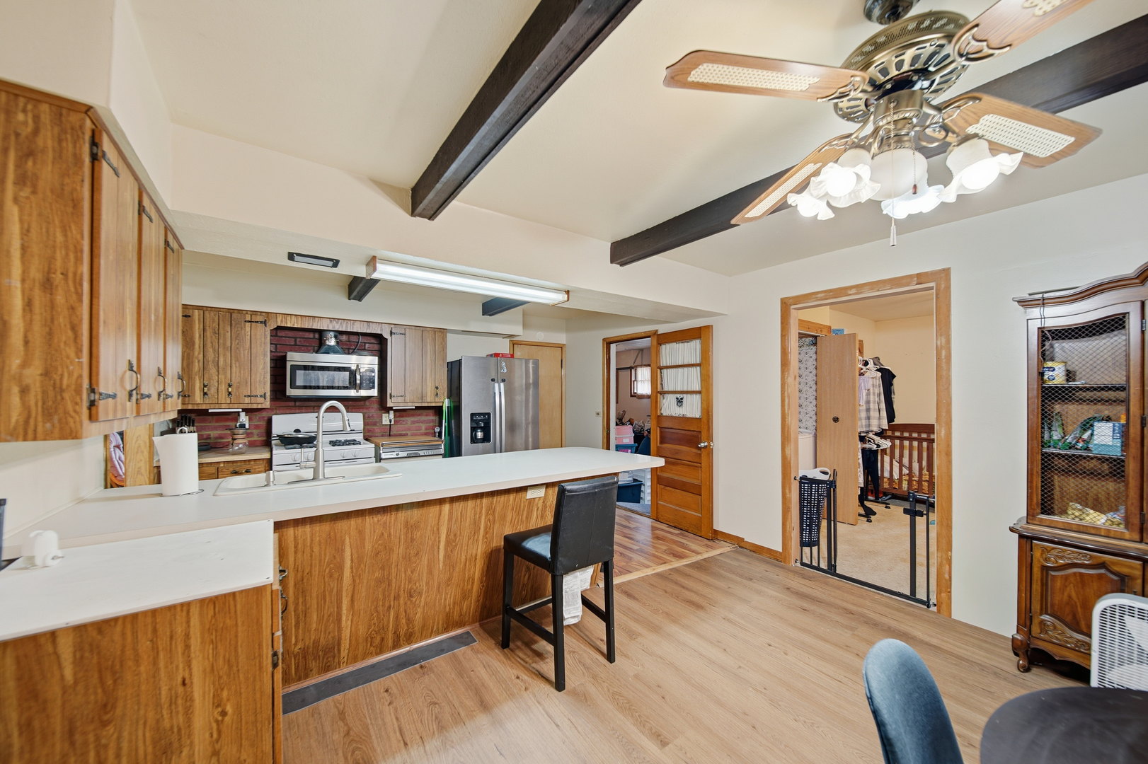 803 4th Avenue Dixon, IL 61021 - Photo 19 of 35 a large kitchen with a table and chairs