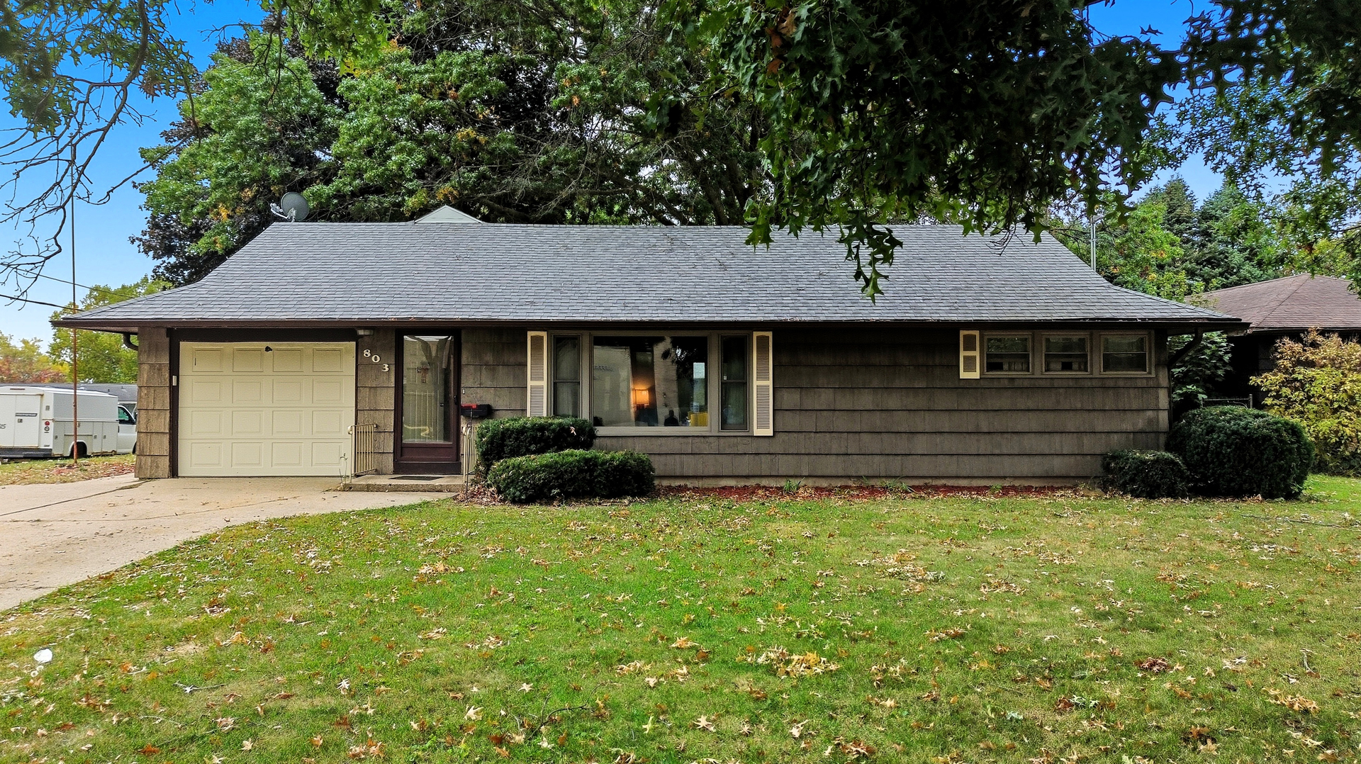 803 4th Avenue Dixon, IL 61021 - Photo 2 of 35 a front view of a house with a garden and trees