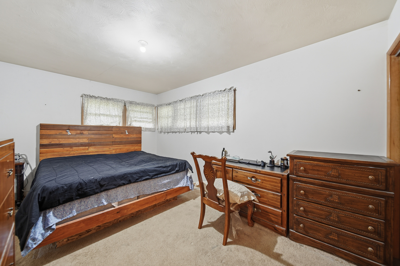 803 4th Avenue Dixon, IL 61021 - Photo 26 of 35 a bedroom with a bed and furniture