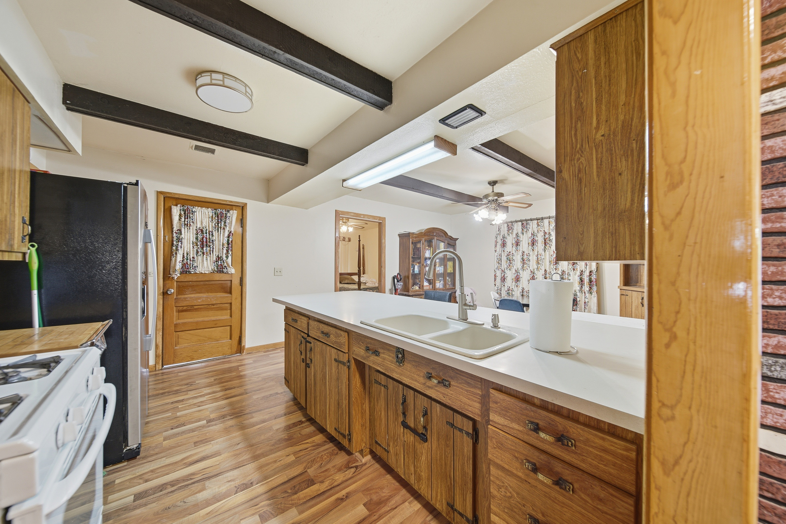 803 4th Avenue Dixon, IL 61021 - Photo 29 of 35 a bathroom with a sink a mirror and a bathtub