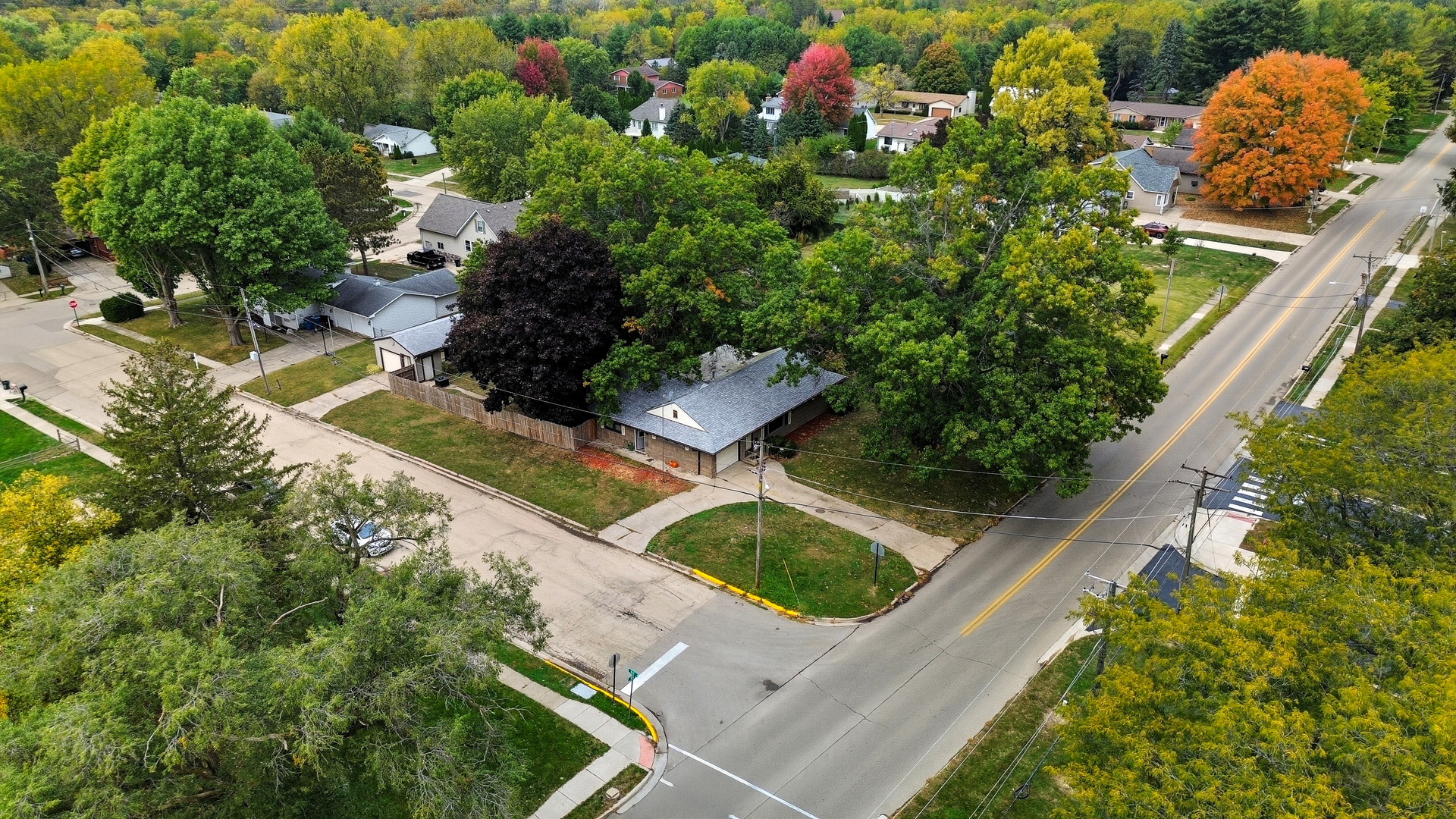 803 4th Avenue Dixon, IL 61021 - Photo 5 of 35 an aerial view of a house with a yard and outdoor seating