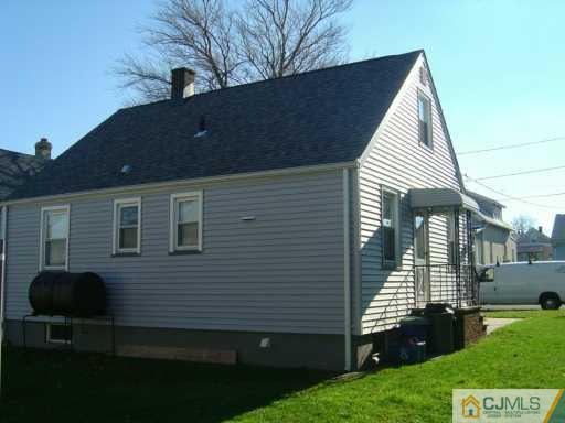 48 Lee Street Port Reading, NJ 07064 - Photo 4 of 4 a view of a house with a yard