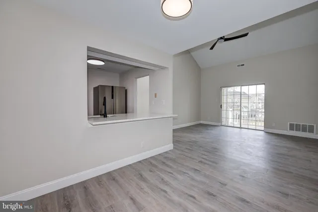 a view of livingroom with hardwood floor and window