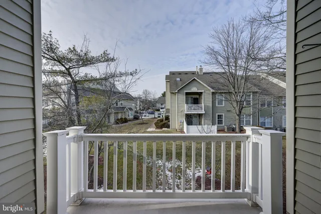 a front view of a house with a small yard