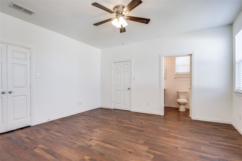 2412 Colquitt Road Terrell, TX 75160 - Photo 11 of 24 a view of empty room with wooden floor