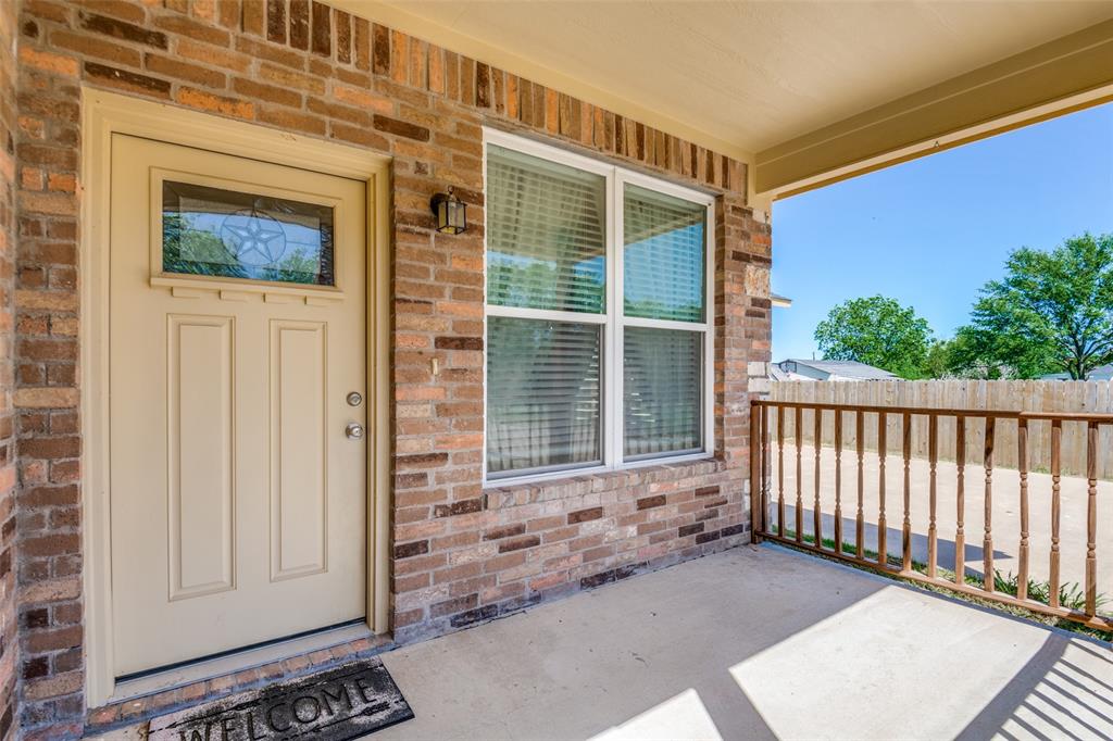 2412 Colquitt Road Terrell, TX 75160 - Photo 2 of 24 a view of a house with a small yard