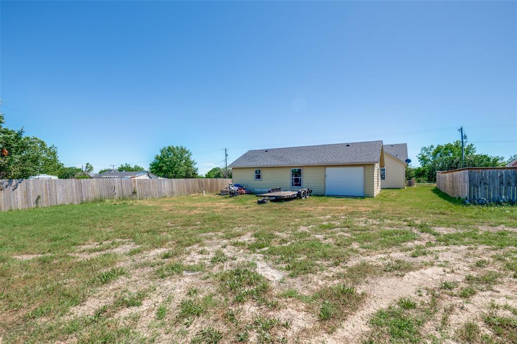 2412 Colquitt Road Terrell, TX 75160 - Photo 24 of 24 a backyard of a house