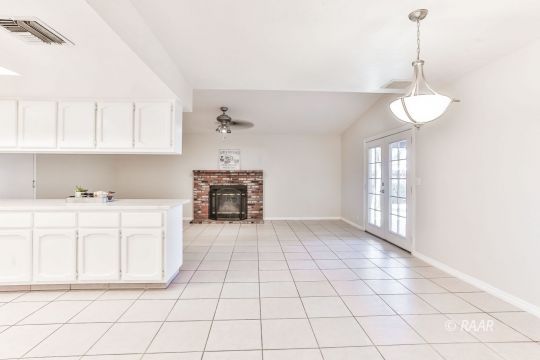 528 South Sorrel Street Ridgecrest, CA 93555 - Photo 7 of 27 a kitchen with cabinets and window