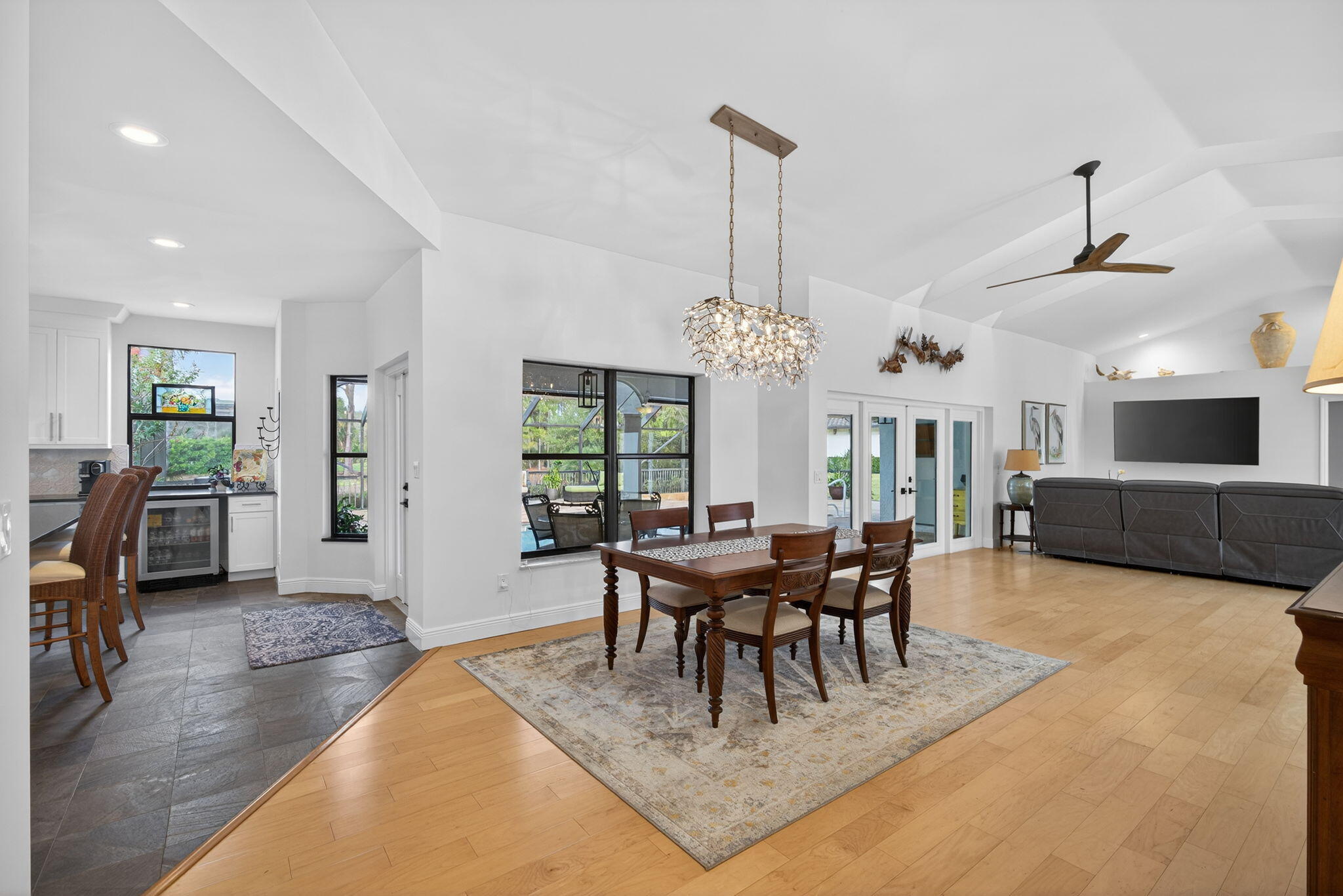 1488 Southeast Colony Way Jupiter, FL 33478 - Photo 13 of 51 a view of a livingroom with furniture window and wooden floor