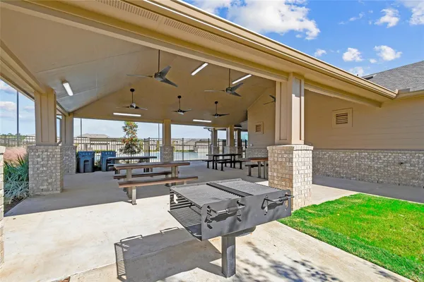 a outdoor space with lots of table and chairs