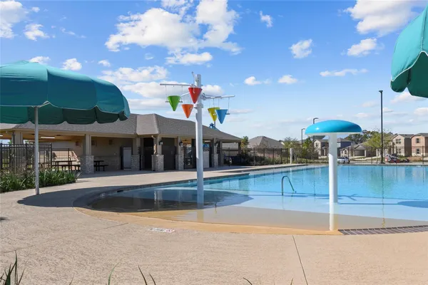 a view of a terrace with swimming pool