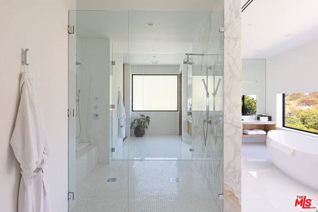 a living room with a furniture and a rug