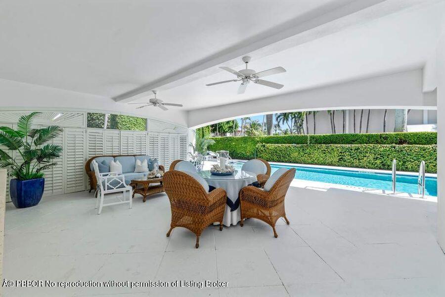 354 Chilean Avenue, Unit 6E Palm Beach, FL 33480 - Photo 14 of 16 a view of a patio in backyard