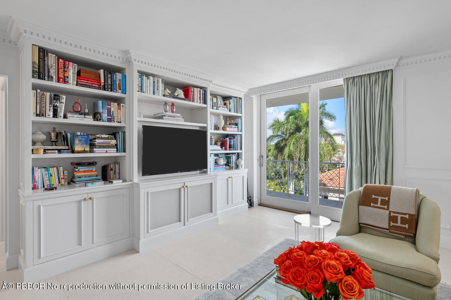 354 Chilean Avenue, Unit 6E Palm Beach, FL 33480 - Photo 3 of 16 a living room with furniture and a flat screen tv