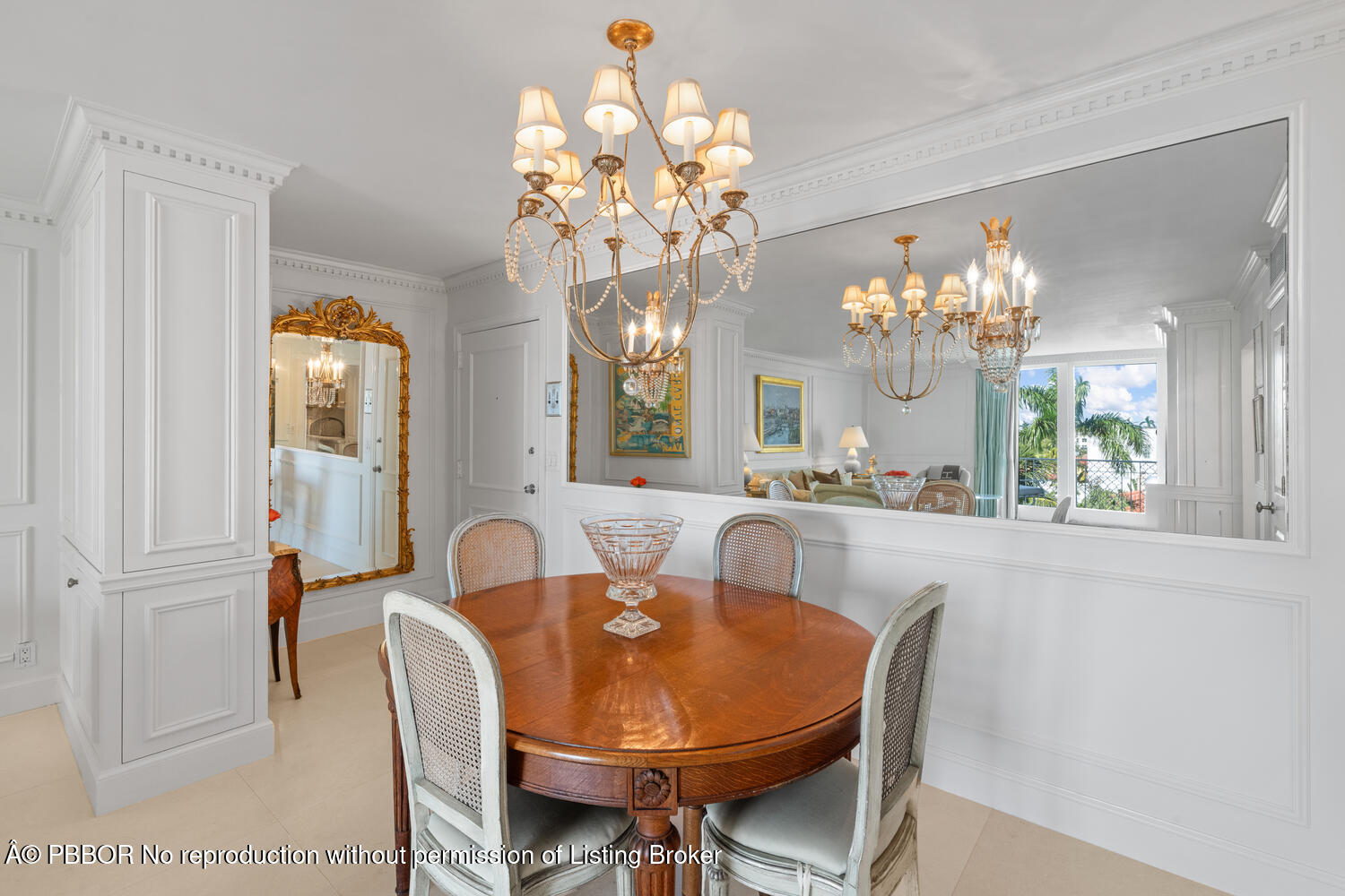 354 Chilean Avenue, Unit 6E Palm Beach, FL 33480 - Photo 6 of 16 a dining room with furniture and chandelier