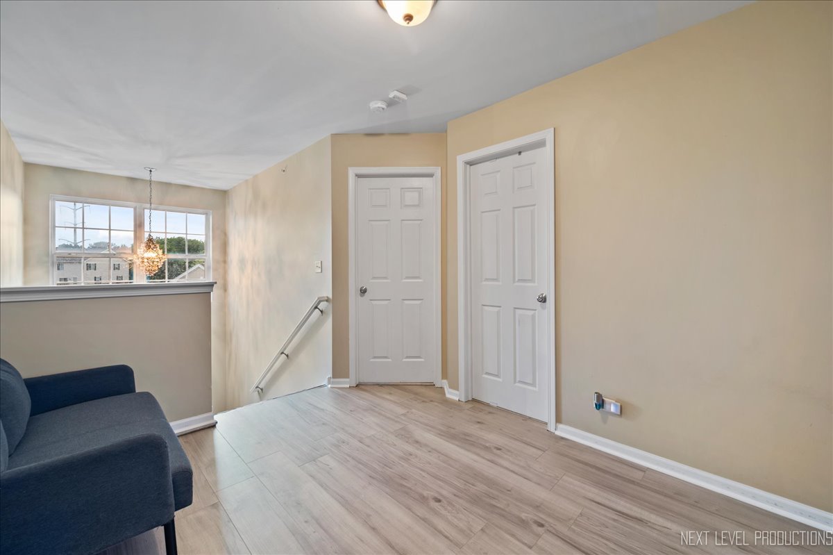3765 Bailey Road Yorkville, IL 60560 - Photo 15 of 27 a big room with wooden floor and windows
