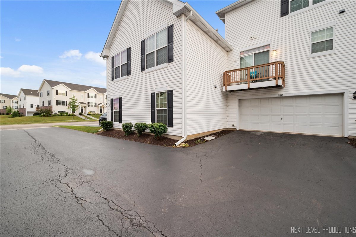 3765 Bailey Road Yorkville, IL 60560 - Photo 23 of 27 a view of a street with cars