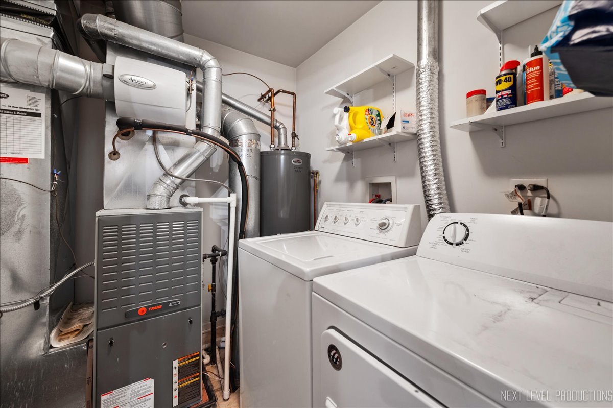 3765 Bailey Road Yorkville, IL 60560 - Photo 10 of 27 a utility room with dryer and washer