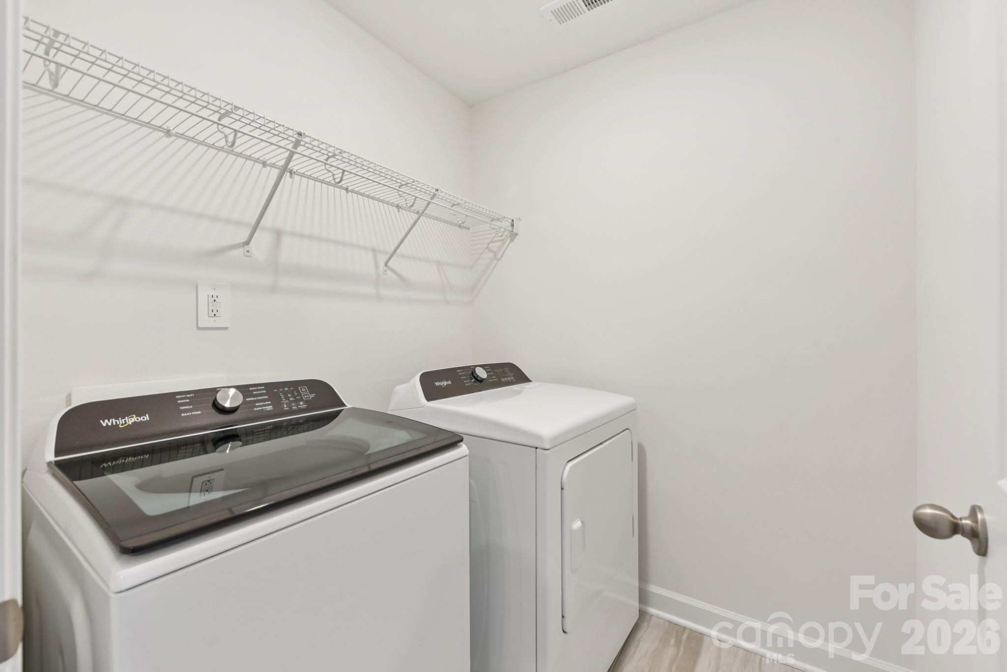 445 Markridge Loop Fort Mill, SC 29708 - Photo 11 of 13 a utility room with dryer and washer