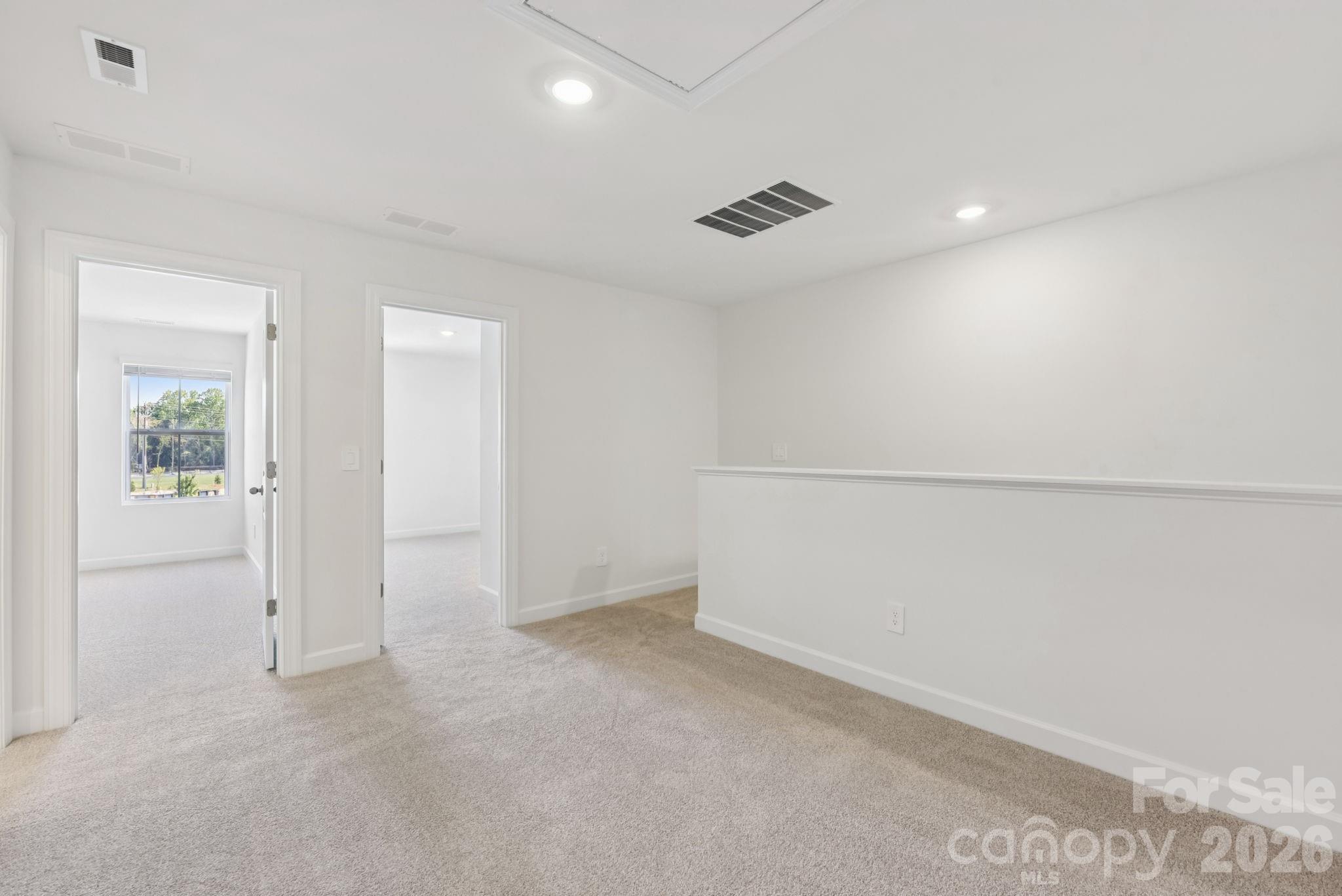 445 Markridge Loop Fort Mill, SC 29708 - Photo 7 of 13 an empty room with an entryway
