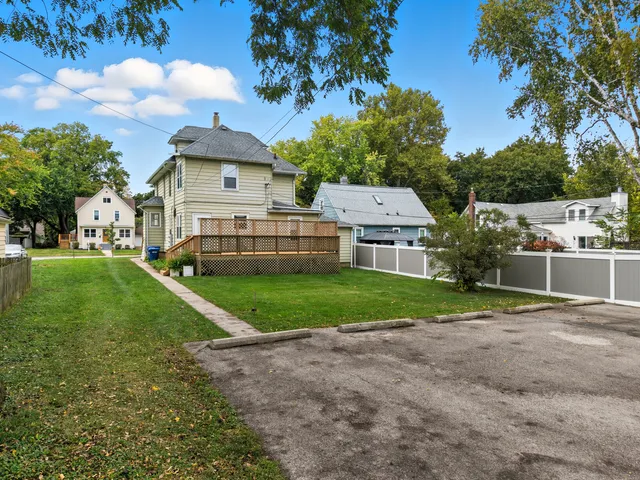 a view of a house with a back yard