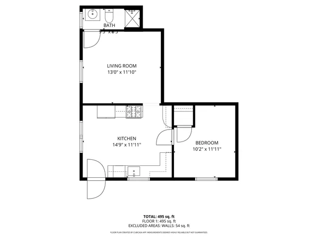 a picture of a bench in front of a wall