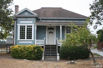 2752 Guerneville Road Santa Rosa, CA 95401 - Photo 1 of 1 a front view of a house with garden