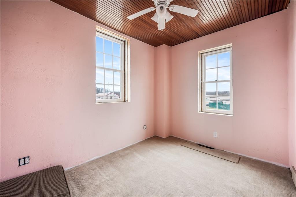 2158 Mercer Road Fredonia, PA 16124 - Photo 31 of 50 an empty room with windows and fan
