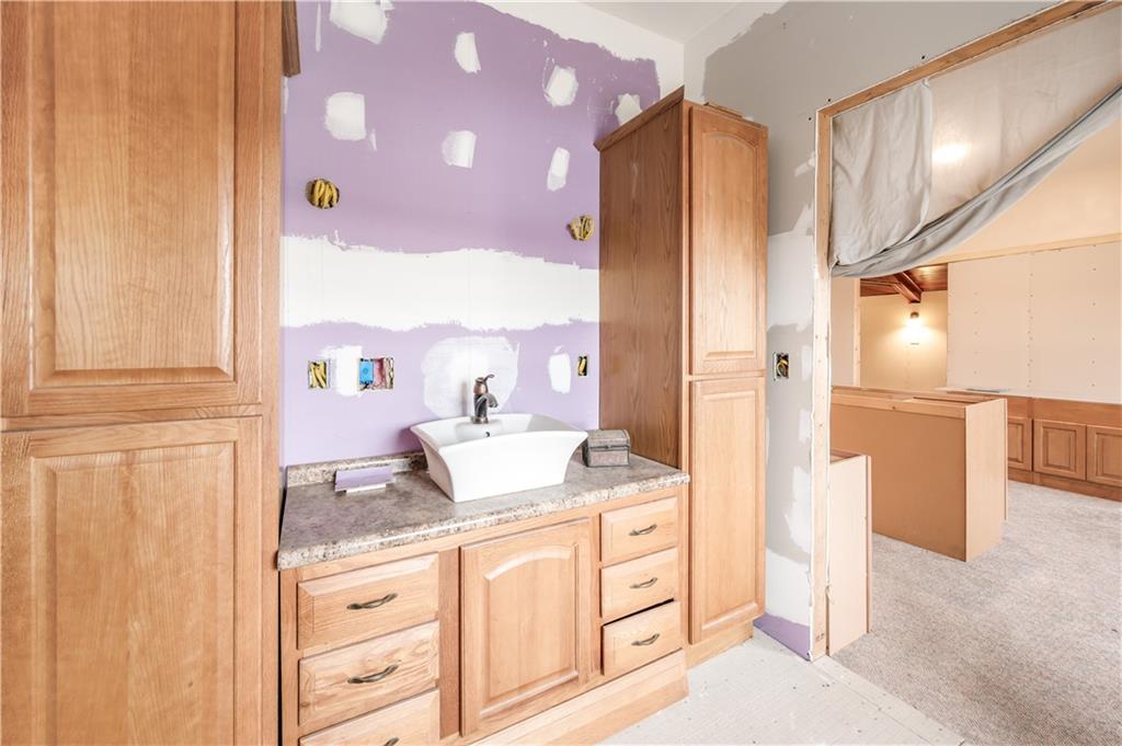 2158 Mercer Road Fredonia, PA 16124 - Photo 10 of 50 a bathroom with a granite countertop sink and a mirror
