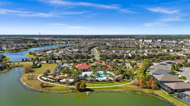 an aerial view of a house with outdoor space